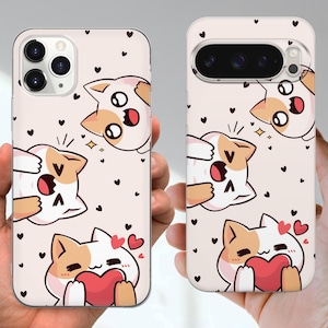 May include: Two phone cases with a repeating pattern of cartoon cats and hearts. The cats are white and tan with expressive faces, some holding red hearts. The background is a light pink color with small black heart shapes.