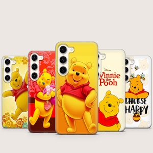 May include: A collection of five phone cases featuring Winnie the Pooh designs. The cases showcase the character in various poses and settings, with vibrant colors and the text "Choose Happy" on one case.
