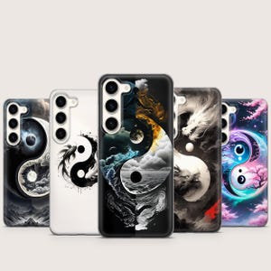 May include: A collection of phone cases featuring Yin and Yang designs. The cases display various artistic interpretations, including a dragon, ocean, and celestial elements. The color palette includes black, white, blue, and pink.
