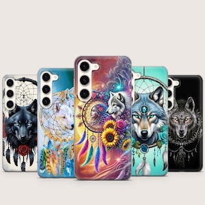 May include: A collection of phone cases featuring wolf and dreamcatcher designs. Each case showcases a different wolf illustration, with vibrant colors and intricate details. The cases are adorned with feathers, flowers, and celestial elements.