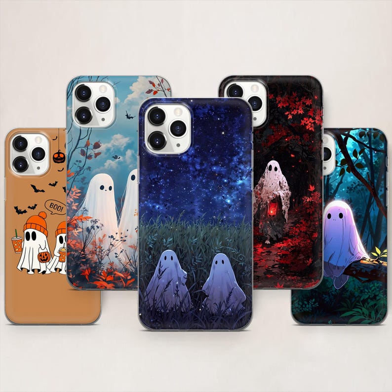 May include: A selection of phone cases with Halloween designs. The cases display illustrations of ghosts in different settings, such as a starry night, a forest, and a pumpkin patch. The cases are in various colours, including brown, blue, and black.