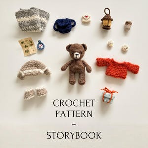 May include: A collection of miniature crochet items, including a teddy bear, hat, scarf, backpack, sweater, and gift box. The text "CROCHET PATTERN + STORYBOOK" is displayed below the items. The items are brown, blue, orange, and beige.
