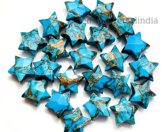 May include: A collection of 20 turquoise star-shaped gemstone beads with gold accents. The beads are approximately 2.5 cm in size and have a smooth, polished finish.