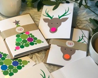 Handfinished Reindeer and Christmas Trees Christmas card pack. Printed on Recycled paper