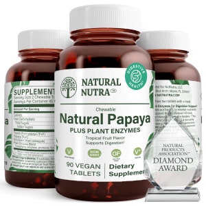 May include: Two brown bottles of Natural Nutra Chewable Natural Papaya Plus Plant Enzymes dietary supplement tablets. The bottles are labeled with the product name, ingredients, and serving size. The bottles are sitting on a white surface. The bottles are next to a clear glass diamond award.