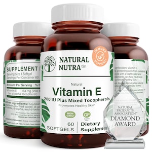 May include: Three brown bottles of Natural Nutra Vitamin E softgels with white labels and a diamond award. The labels read "200 IU Plus Mixed Tocopherols" and "Promotes Healthy Skin".