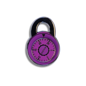 May include: A purple combination padlock with a silver metal body and a silver dial. The dial has numbers from 0 to 25 and the word "Soodle" printed on it.