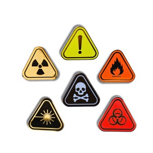 May include: Six yellow, orange, red, and black triangular warning signs with different symbols. The symbols include a radiation symbol, a skull and crossbones, a fire symbol, a biohazard symbol, a laser beam symbol, and an exclamation point.