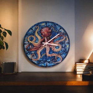 May include: A round wall clock with a stained glass design featuring an octopus with blue, red, and yellow accents. The clock hands are white.