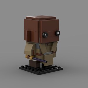 Peut inclure: Une figurine Lego Star Wars en minifigure de couleur marron et beige avec un sabre laser. La figurine a une tête marron avec des yeux noirs et un corps beige avec une ceinture marron. La figurine tient un sabre laser violet.