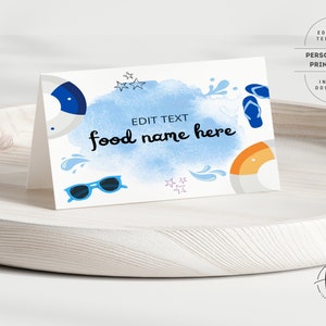 May include: Blue and white food label with a watercolor background. The label features a blue and white life preserver, blue sunglasses, blue flip flops, and blue and white stars. The text on the label reads "EDIT TEXT food name here".