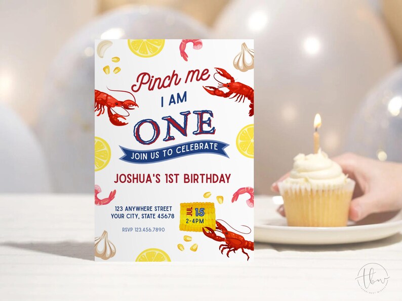 May include: A birthday invitation with a red and blue colour scheme featuring a lobster, lemons, garlic, and corn. The text reads "Pinch me I am one. Join us to celebrate Joshua's 1st Birthday. 123 Anywhere Street, Your City, State 45678. RSVP 123.456.7890. 1-15 2-4PM."