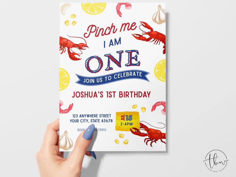 May include: A white birthday invitation featuring a red lobster, lemons, garlic, and corn. The text reads "Pinch me I am ONE. Join us to celebrate Joshua's 1st Birthday. 123 Anywhere Street, Your City, State 45678. 15 2-4PM. RSVP 66.7890."
