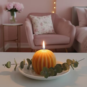 Beeswax candle "Riffel-Kugel" from our own apiary – Natural, sustainable and fragrant candle for your home