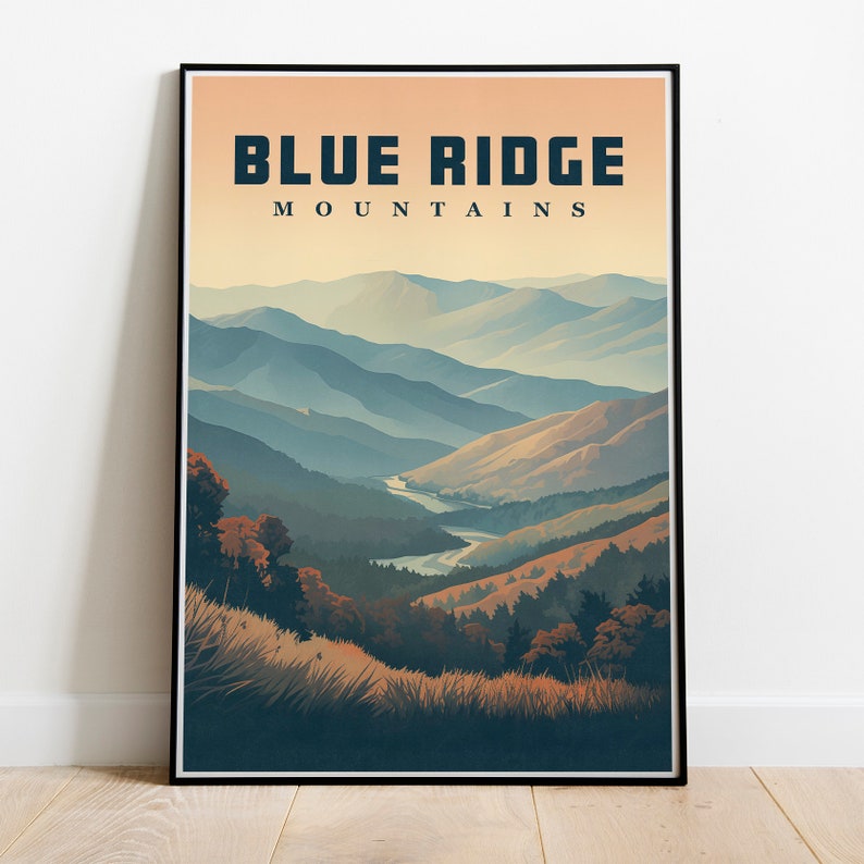 May include: A framed art print depicting the Blue Ridge Mountains in a stylized landscape. The artwork shows layers of blue and tan mountain ranges beneath a peach sky. The words "BLUE RIDGE MOUNTAINS" are printed at the top.