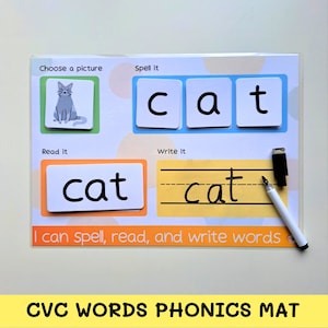 May include: A colorful phonics learning mat with a picture of a cat, the word "cat" spelled out, and a space to write the word. The mat is designed for children learning to read and write.