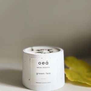 Scented candle 'green tea' made from soy and rapeseed wax in a concrete container with a wooden wick (small)