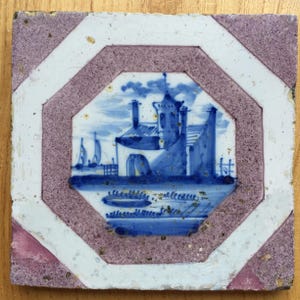 Antique 18th century Dutch Delft landscape tile with shepherd
