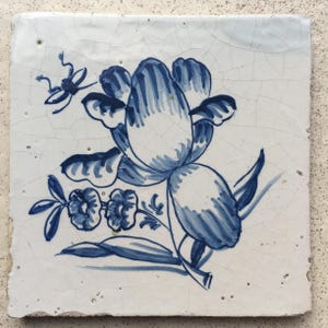 Antique 17th century Dutch Delft tile with rose