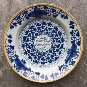 Antique 18th century Dutch Delft plate with saying