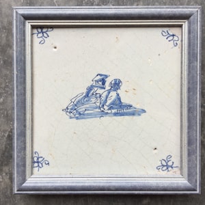 Antique 17th century Dutch Delft tile with lovers