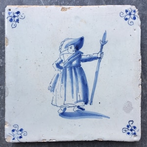 Antique 17th century Dutch Delft tile with a City Guard
