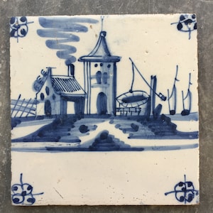 Antique Dutch Delft landscape tile