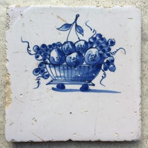 Antique 18th century Dutch Delft tile with still-life