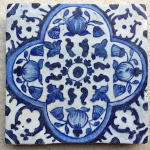 Antique 17th century Dutch Delft tile with the decoration of pomegranates
