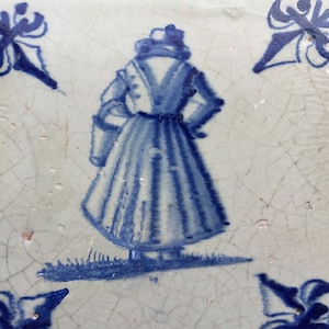 Antique 17th century Dutch Delft tile with maid
