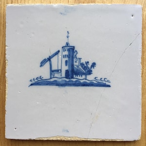 Antique 17th century Dutch Delft tile with a landscape