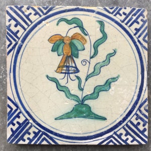 Antique 17th century Dutch Delft tile with Daffodil