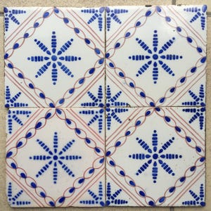 Antique 19th century Dutch Delft tiles with star ornaments