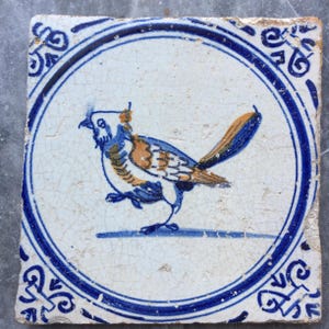 Rare Antique 17th century Dutch Delft tile hopping bird