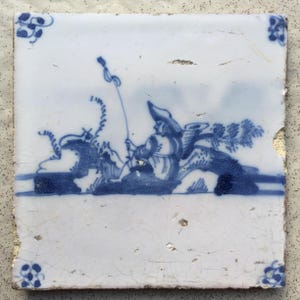 Antique 18th century Dutch Delft tile with a shepherd