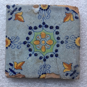 Antique 17th century Dutch Delft tile with ornamental design
