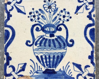 Antique Dutch Delft tile with flower vase