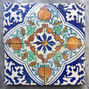Antique 17th century set of four Dutch Delft tiles with pomegranates