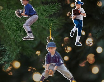 May include: Three personalized baseball ornaments featuring photos of young players in action. Each ornament is a unique keepsake for a baseball fan.