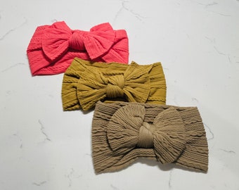 Baby girl bow headband, stretchy knit nylon fabric and a variety of colors