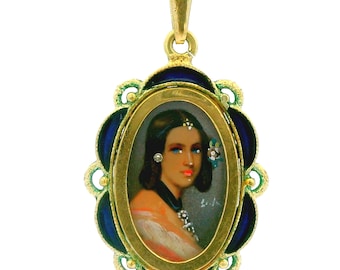 May include: An oval gold pendant featuring a miniature portrait of a person with dark hair, blue eyes, and bright red lips. The portrait is framed by a scalloped border of deep blue enamel and gold filigree, with a small bail at the top.