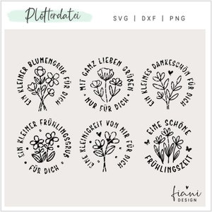 Könnte beinhalten: Vier schwarze und weiße runde Stempeldesigns mit floralen Illustrationen und deutschem Text. Der Text beinhaltet "Ein kleiner Blumen Gruß für dich", "Mit ganz lieben Grüßen nur für dich", "Ein kleines Dankeschön für dich" und "Eine schöne Frühlingszeit".