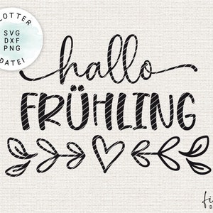 K&ouml;nnte beinhalten: Schwarz-wei&szlig;es Grafikdesign mit dem Text "hallo fr&uuml;hling" in handschriftlicher Form. Das Design enth&auml;lt ein Herz und stilisierte Bl&auml;tter.