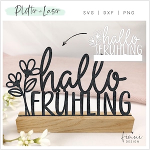 Könnte beinhalten: Schwarz-weißes Ausschnittdesign des Textes "Hallo Frühling" mit einem floralen Design auf der linken Seite. Das Design ist auf einem Holzsockel montiert.