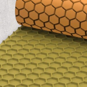 May include: A close-up of a yellow honeycomb rolling pin with a brown honeycomb pattern. The rolling pin is made of silicone and is designed for baking and decorating.