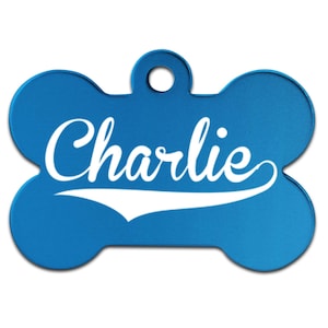 May include: Blue bone-shaped dog tag with the name "Charlie" in white lettering.