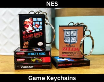 Mini llavero con funda de juego NES, diseño retro, miniatura para Nintendo Entertainment System, llavero para fiesta de cumpleaños, regalo de jugador de Mario