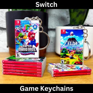 Mini Switch Game Case porte-clés, pochettes de protection Nintendo, jeux portables miniatures, fête d'anniversaire, porte-clés sac butin, cadeau 3D Mario Gamer