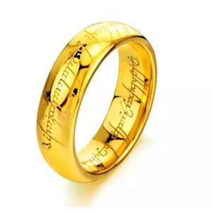 May include: A gold-coloured ring with an inscription in an ancient language. The inscription is visible on the outside of the ring.