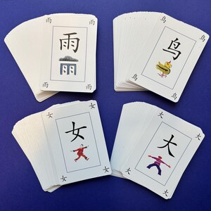 Familias felices: juego para aprender chino mandarín, palabras chinas de uso común, para estudiantes de primaria, primaria y principiantes - © Primary Mandarin ™